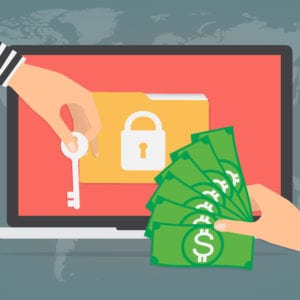 Businessman hand holding money banknote for paying the key from hacker for unlock folder got ransomware malware virus computer