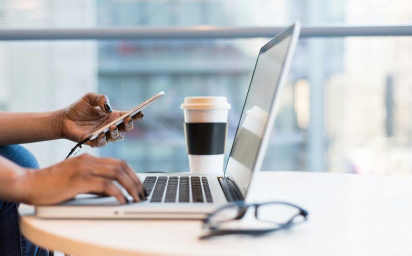 Free laptop on table top stock photo