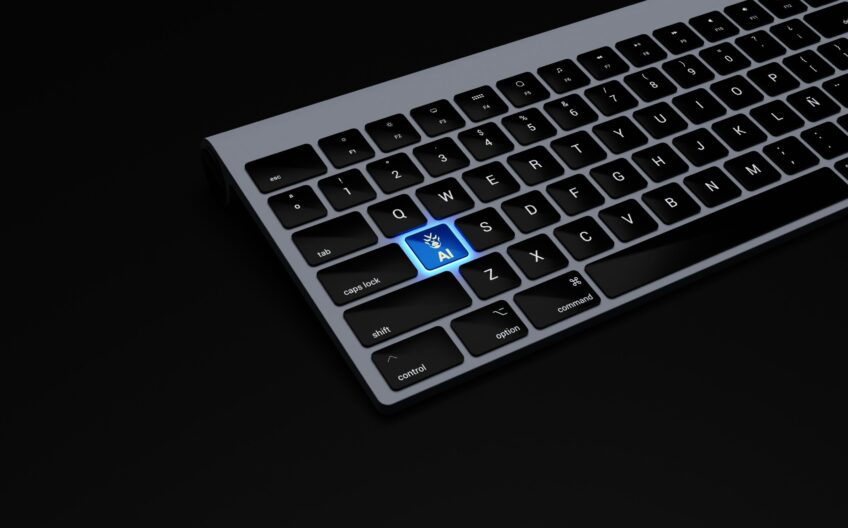 a black keyboard with a blue button on it