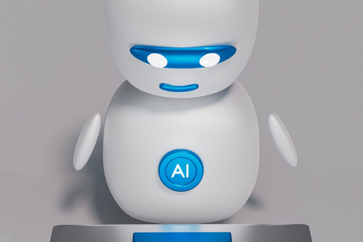 a white robot sitting on top of a table